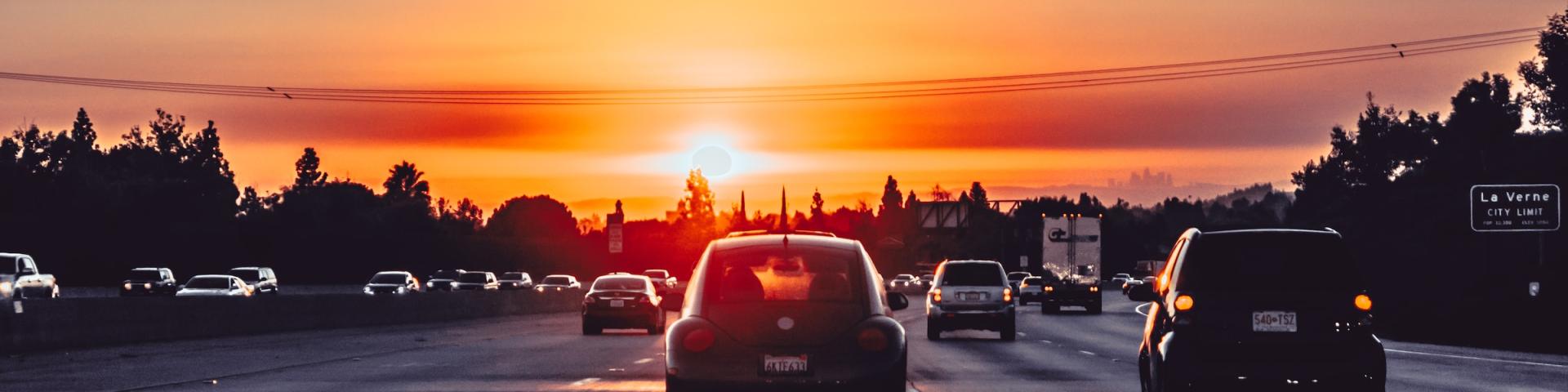 A sunset over a highway